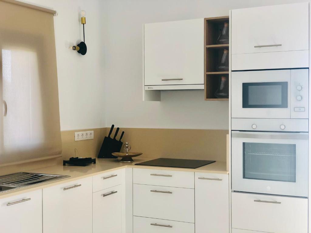 Kuchyň nebo kuchyňský kout v ubytování Canaryislandshost l My Nest