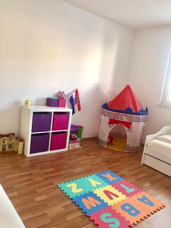 Posteľ alebo postele v izbe v ubytovaní Apartmani Dujmovic