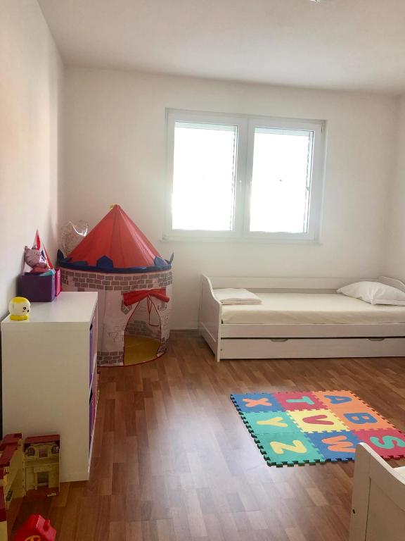 Posteľ alebo postele v izbe v ubytovaní Apartmani Dujmovic