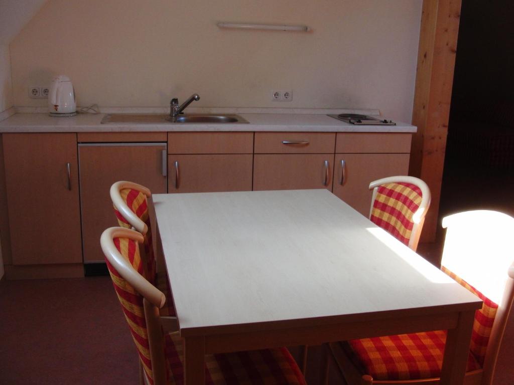Kuchyň nebo kuchyňský kout v ubytování Hotel Angerer