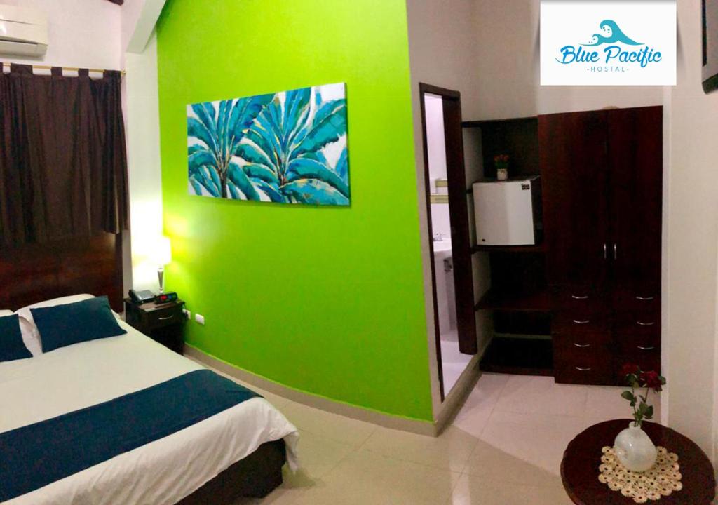 Postel nebo postele na pokoji v ubytování Hostal Blue Pacific
