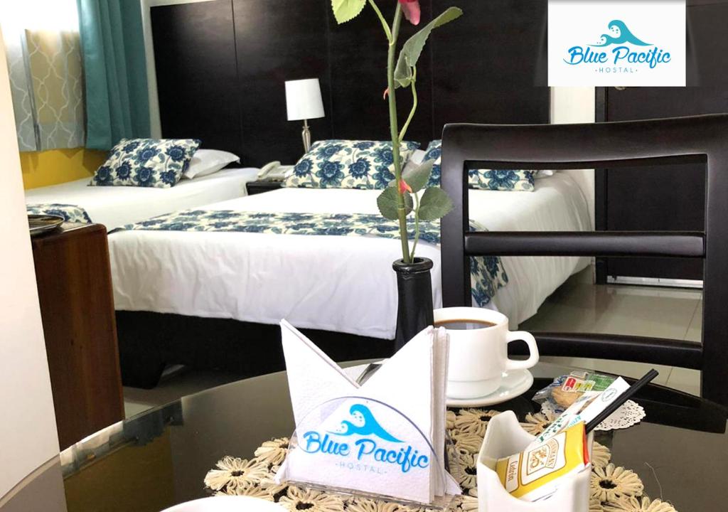 Postel nebo postele na pokoji v ubytování Hostal Blue Pacific