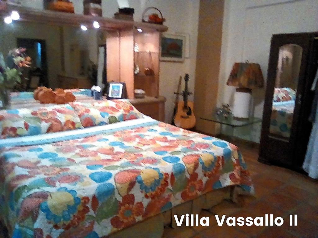 Postel nebo postele na pokoji v ubytování Villa Vassallo