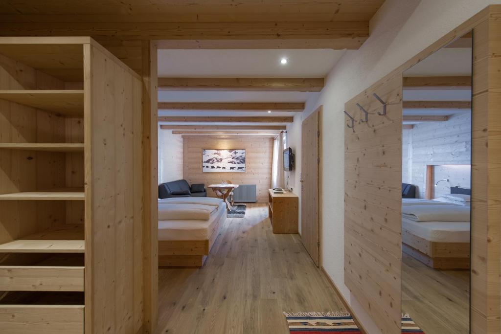 Postel nebo postele na pokoji v ubytování Hotel Garni Pirchhütt