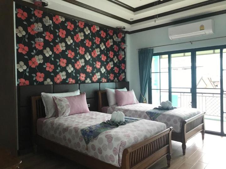 Letto o letti in una camera di TC villa on beach