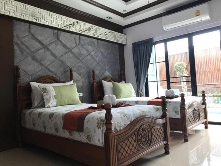 Letto o letti in una camera di TC villa on beach
