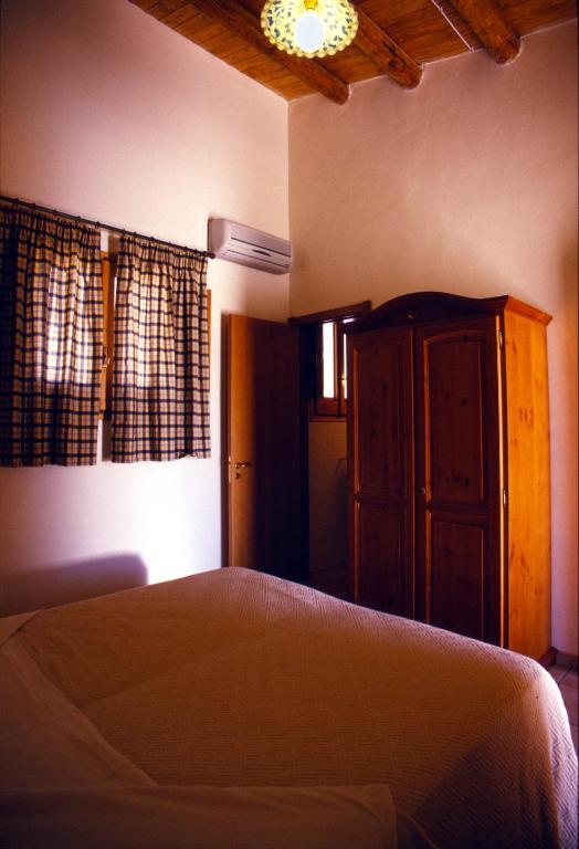Postel nebo postele na pokoji v ubytování Agriturismo Al Casale