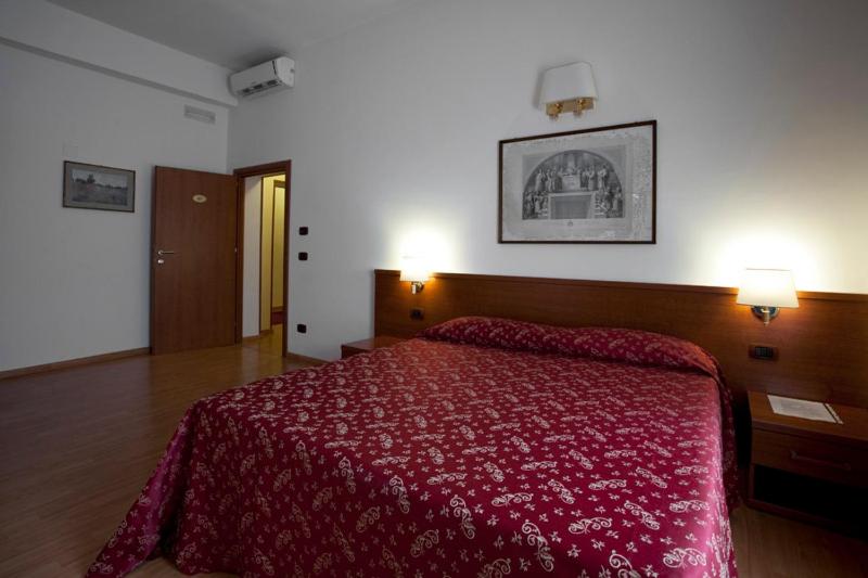 Posteľ alebo postele v izbe v ubytovaní Domus Appia 154 B&B