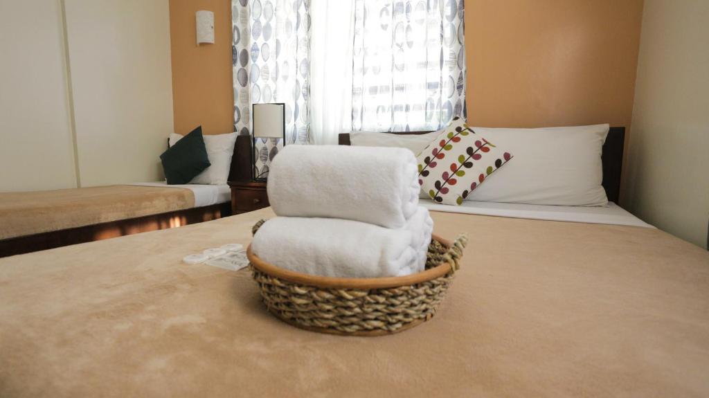 Postel nebo postele na pokoji v ubytování Casa Coron Hotel
