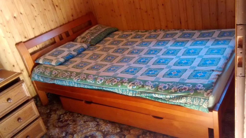 Postel nebo postele na pokoji v ubytování dom letni