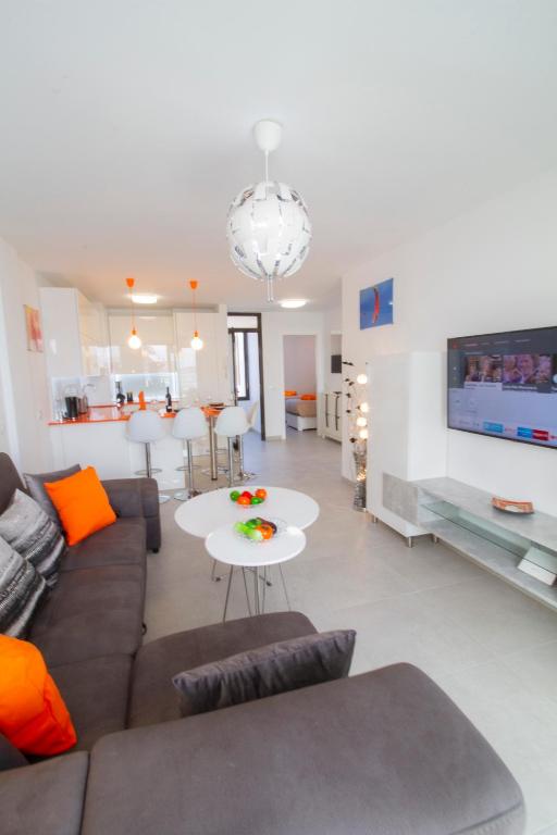 Posedenie v ubytovaní MEDANO4YOU Orange Dream Holiday Home