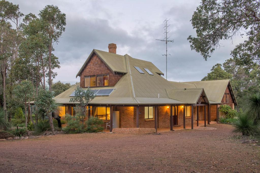 a house with a gambrel roof at A Hidden Bush Delight in Dunsborough