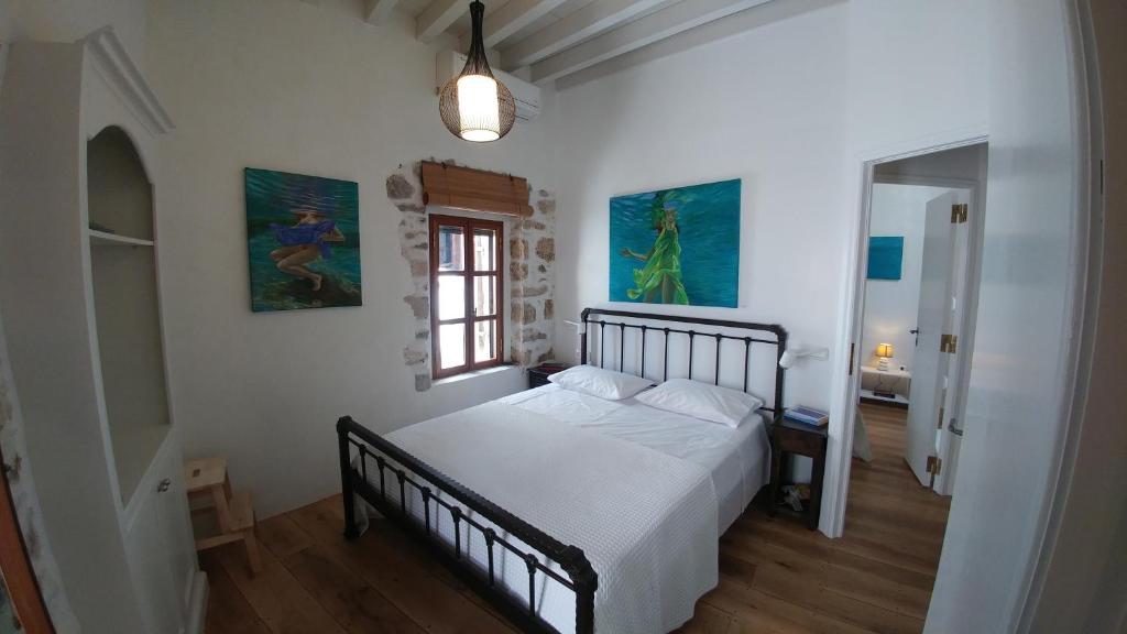 Postel nebo postele na pokoji v ubytování Amaranti House n Art