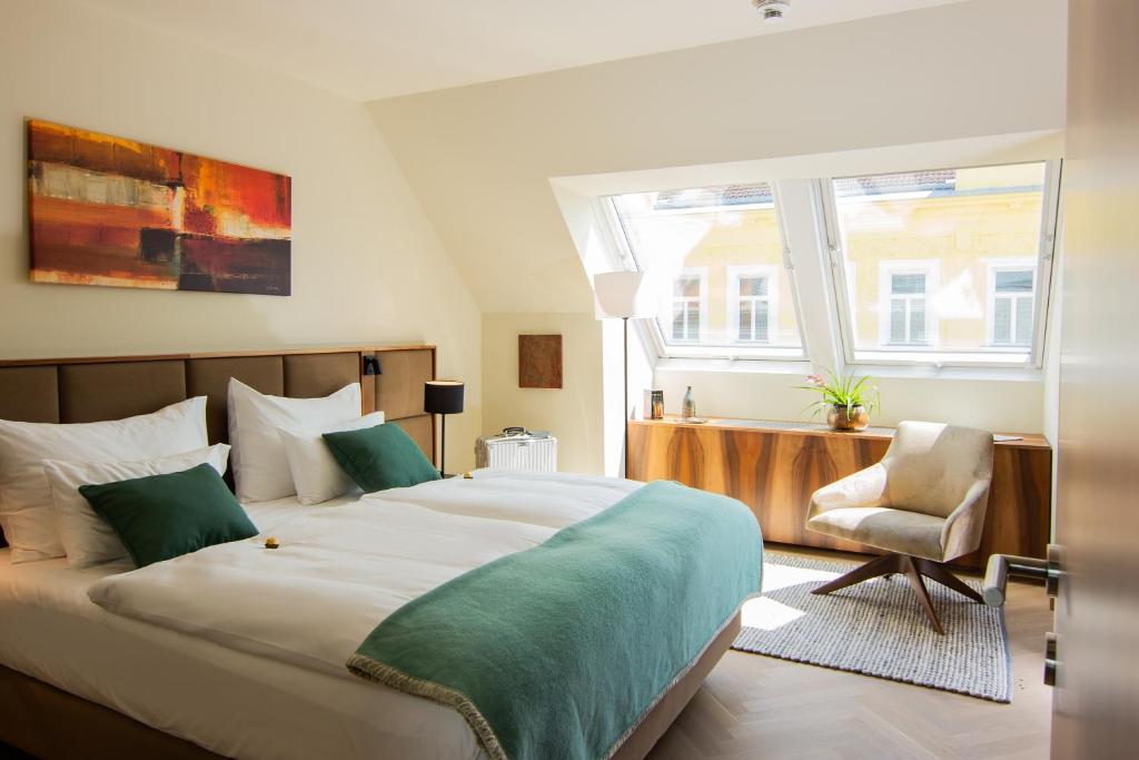 Postel nebo postele na pokoji v ubytování EST Residence Schönbrunn Vienna - Apartments