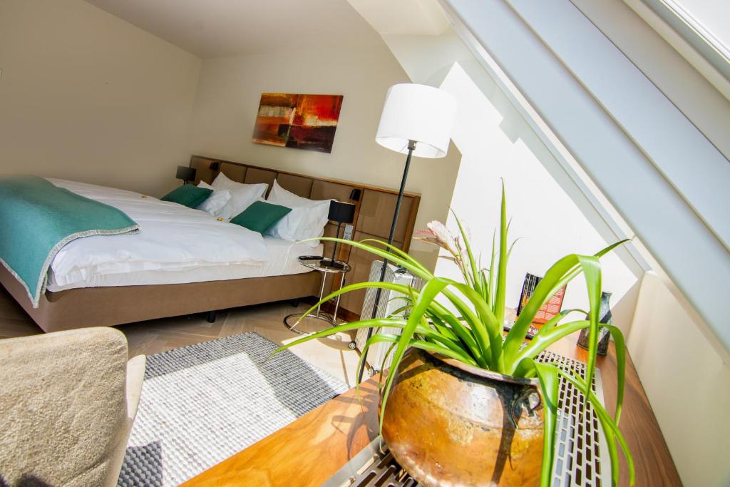 Postel nebo postele na pokoji v ubytování EST Residence Schönbrunn Vienna - Apartments