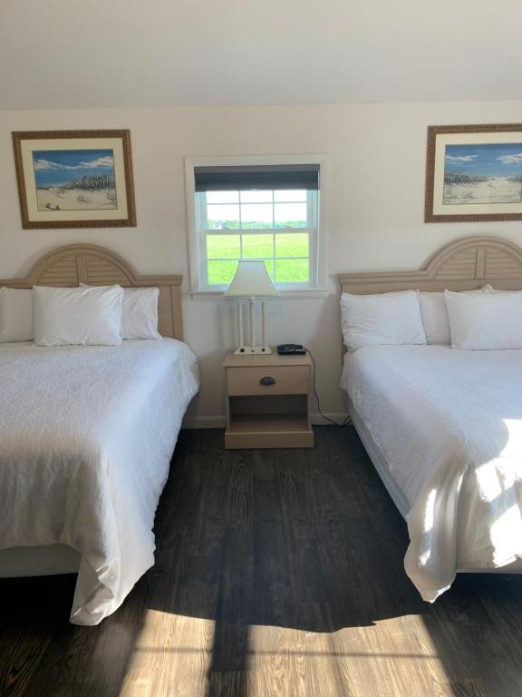 Postel nebo postele na pokoji v ubytování Cape Motel