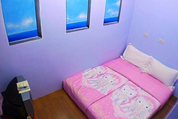 Postel nebo postele na pokoji v ubytování Hai Zhi Dao Min Su