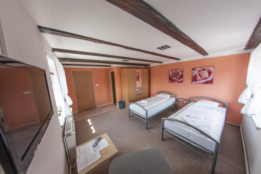 Postel nebo postele na pokoji v ubytování Penzion SLANINA