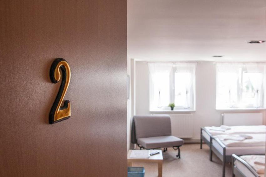 Postel nebo postele na pokoji v ubytování Penzion SLANINA