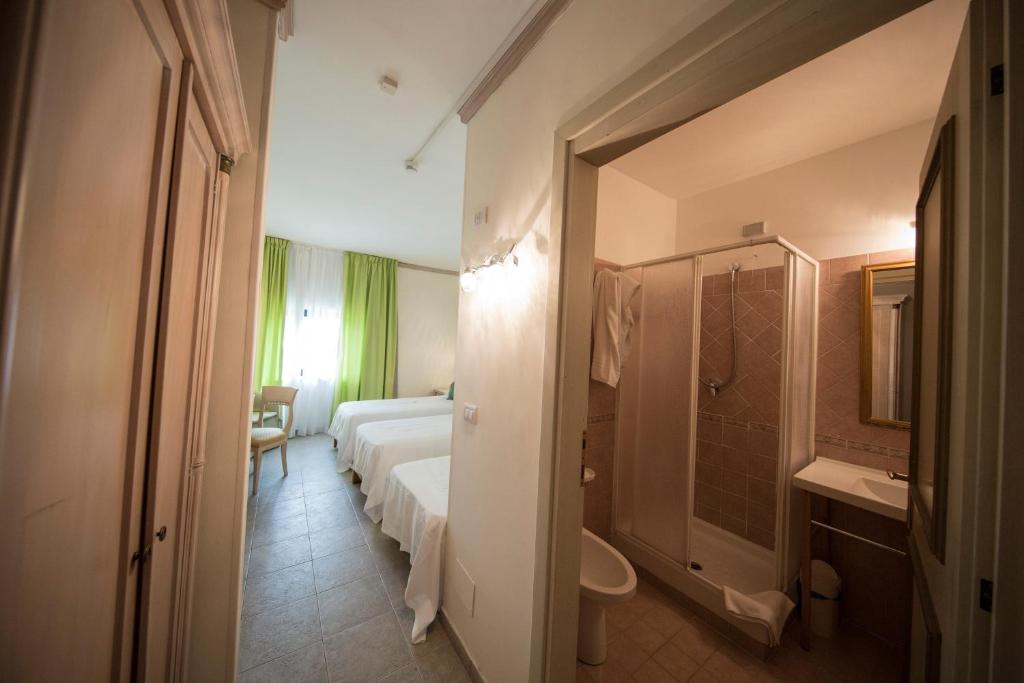 Koupelna v ubytování Mancini Park Hotel
