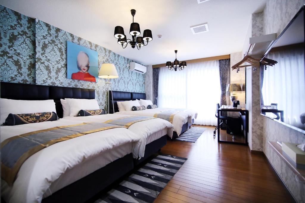 Postel nebo postele na pokoji v ubytování SHINJUKU GLOBAL HOTEL