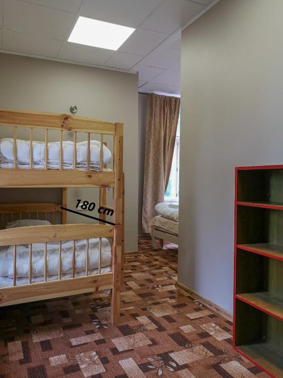 Postel nebo postele na pokoji v ubytování Villa Kadriorg Hostel