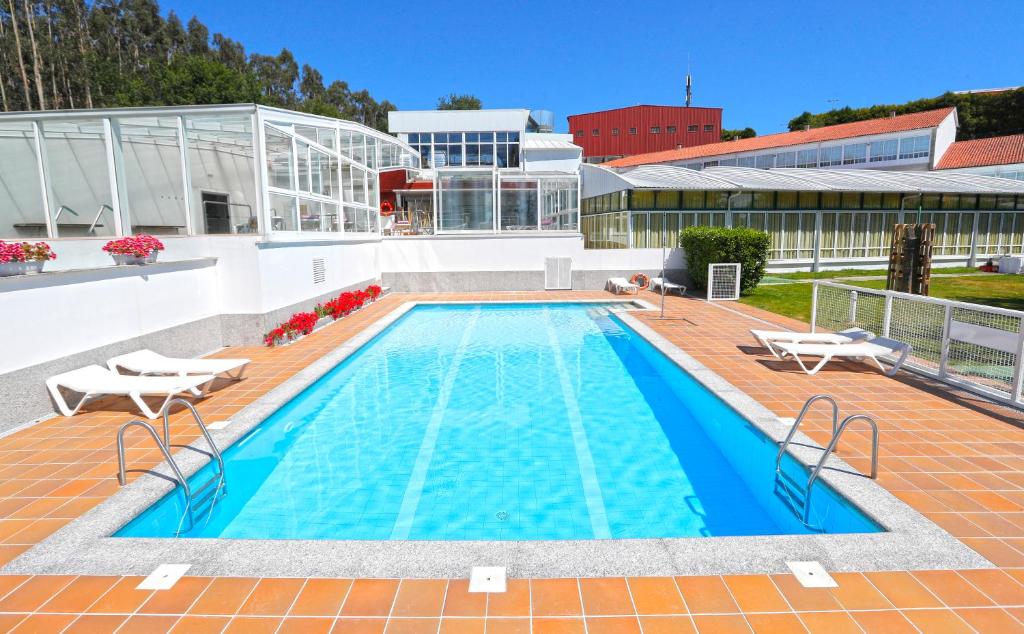 Bazén v ubytování Hotel Spa Congreso nebo v jeho okolí