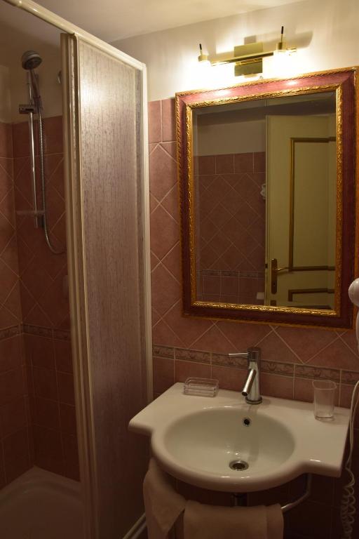Koupelna v ubytování Mancini Park Hotel