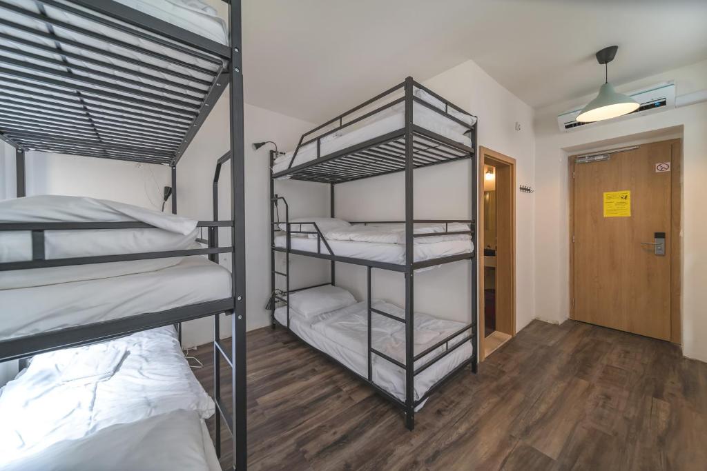 Postel nebo postele na pokoji v ubytování Hostel Orange
