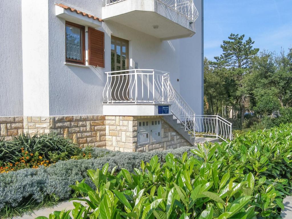 Vonkajšia záhrada v ubytovaní Apartment Fuma-1 by Interhome