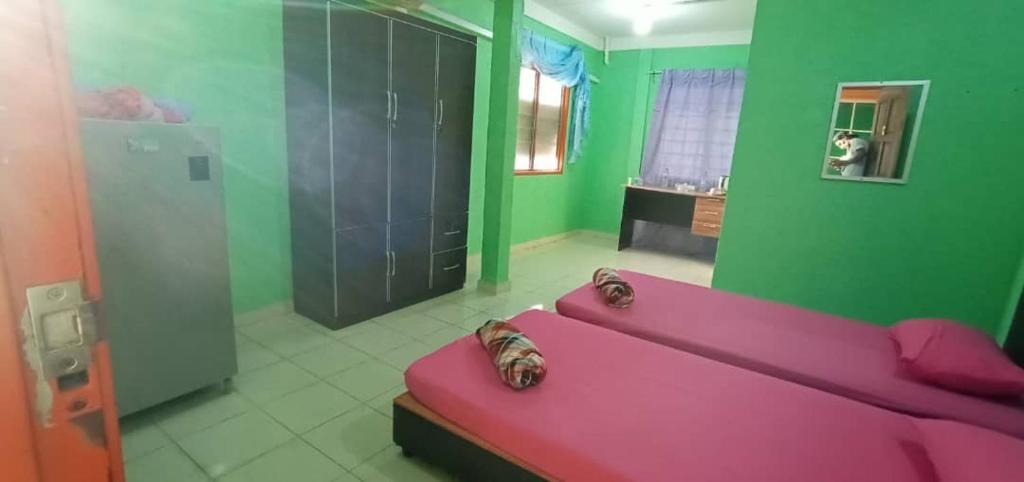 Postel nebo postele na pokoji v ubytování DAOH'S Rooms & Scooters