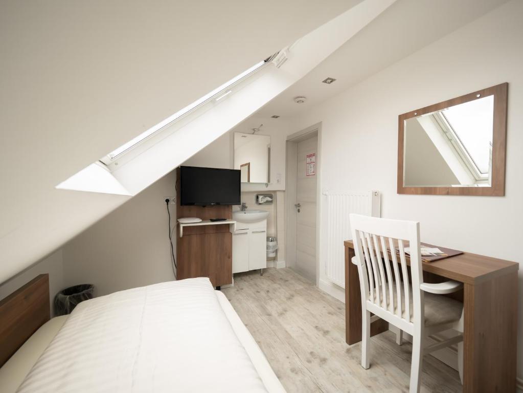 Kuchyň nebo kuchyňský kout v ubytování Hotel Boritzka