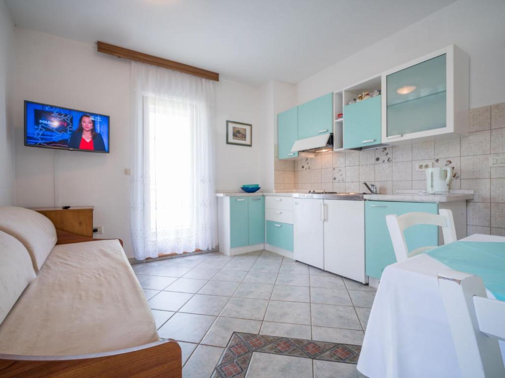 Kuchyňa alebo kuchynka v ubytovaní Apartment Fuma-1 by Interhome