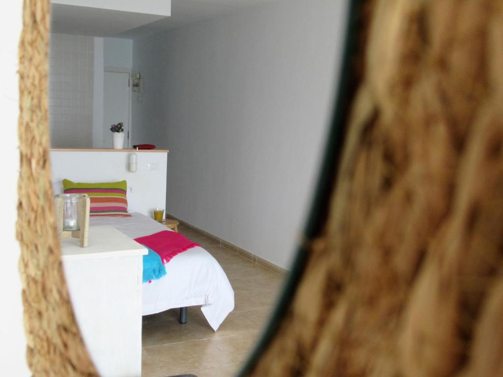 Posteľ alebo postele v izbe v ubytovaní Vivelorural Canteras 208 beach front with wifi