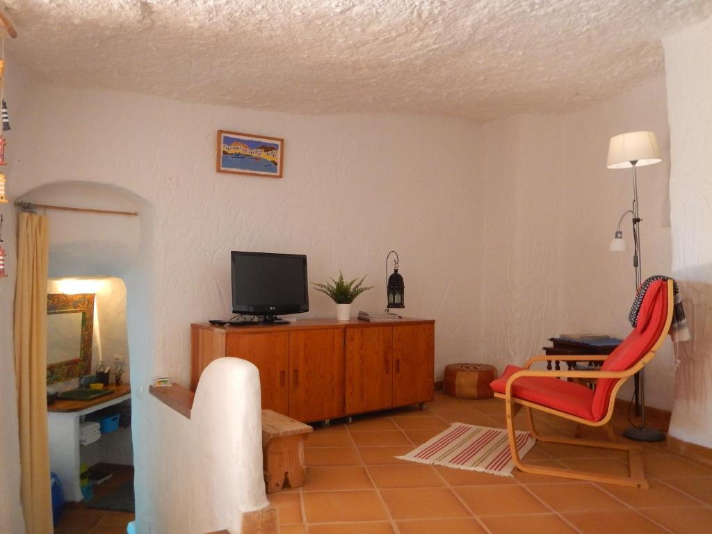 TV a/nebo společenská místnost v ubytování Vivelorural casa La Cuevita, Santa Brígida
