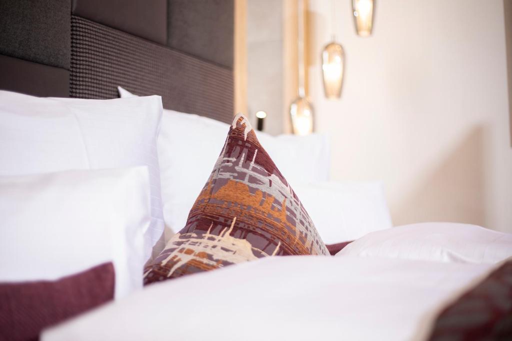 Postel nebo postele na pokoji v ubytování Wagner's Aparthotel