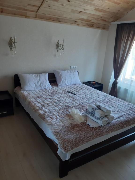 Postel nebo postele na pokoji v ubytování ARKADIYA HOUSE