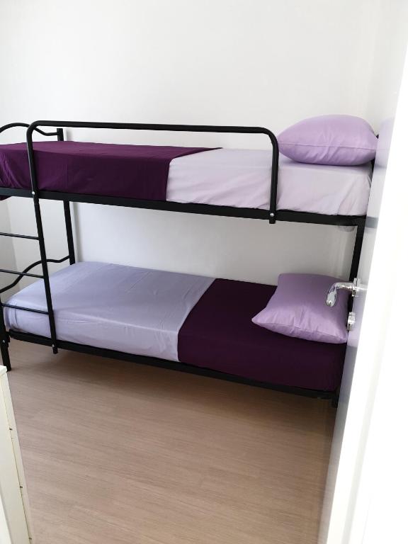 Postel nebo postele na pokoji v ubytování I TREPPONTI