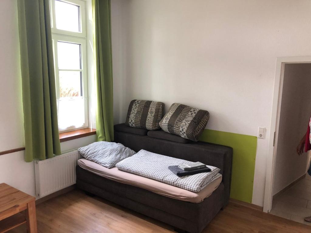 Postel nebo postele na pokoji v ubytování Hof Jüttmann