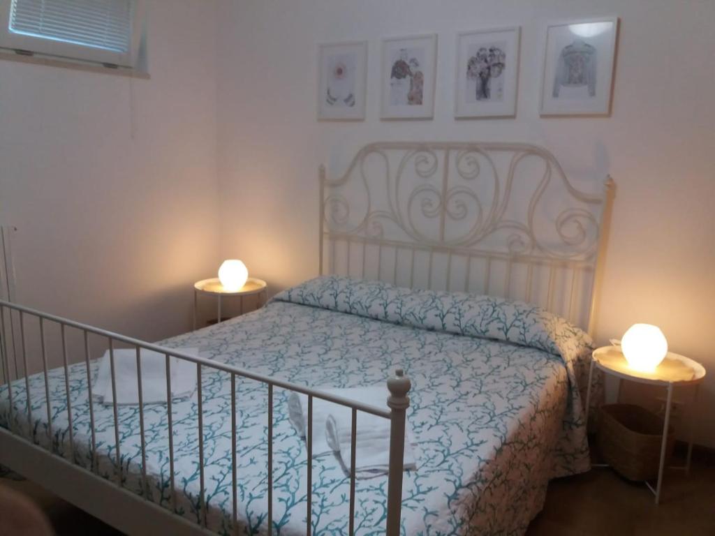 Postel nebo postele na pokoji v ubytování A casa della scrittrice - To the writer's house