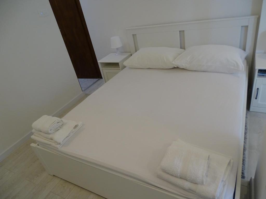 Posteľ alebo postele v izbe v ubytovaní Job studio apartments