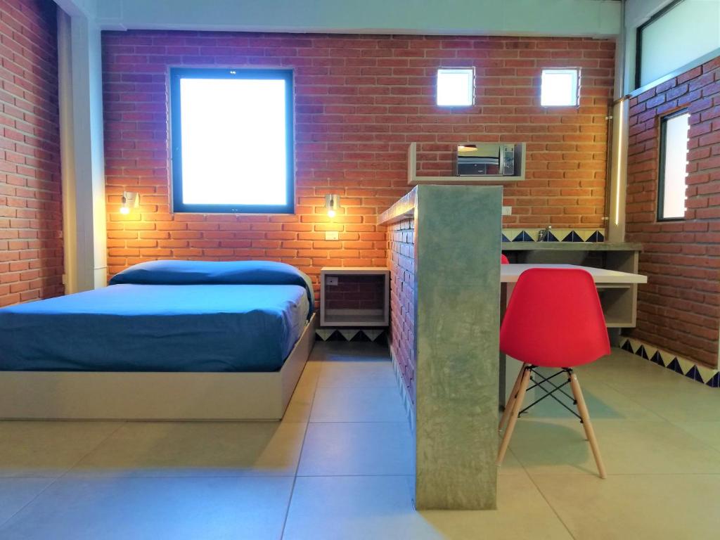 Postel nebo postele na pokoji v ubytování Terraza del Alférez