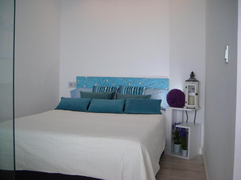 Postel nebo postele na pokoji v ubytování Castillo de Santa Clara Luxury