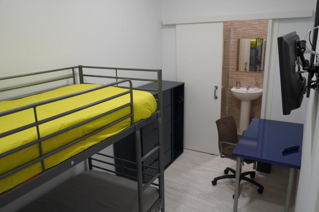 Postel nebo postele na pokoji v ubytování Coworking Studio