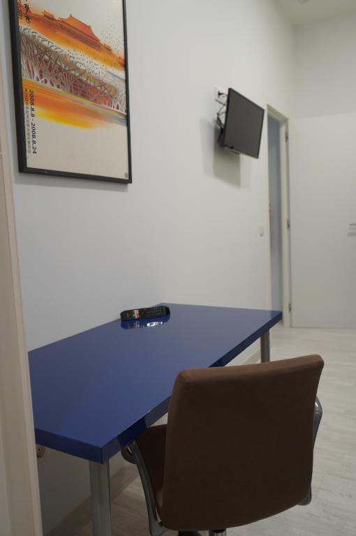 TV a/nebo společenská místnost v ubytování Coworking Studio