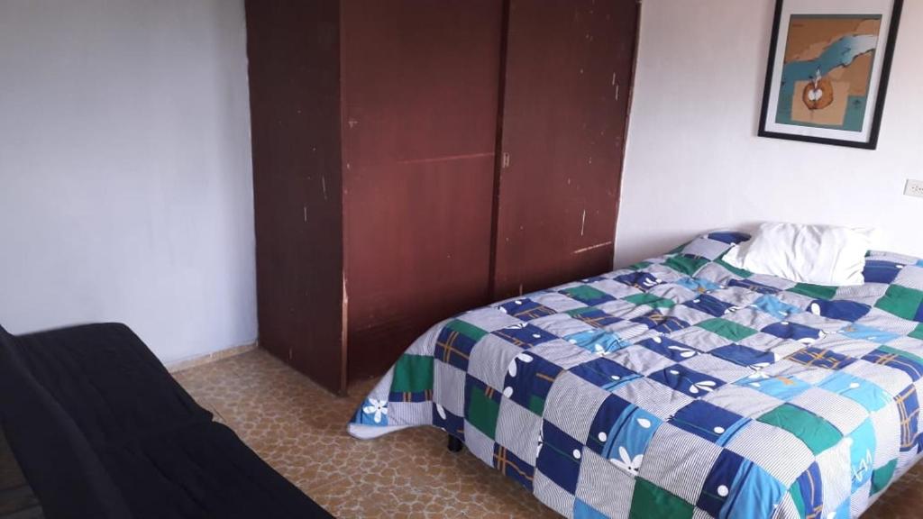 Postel nebo postele na pokoji v ubytování El laberinto hospedaje en casa
