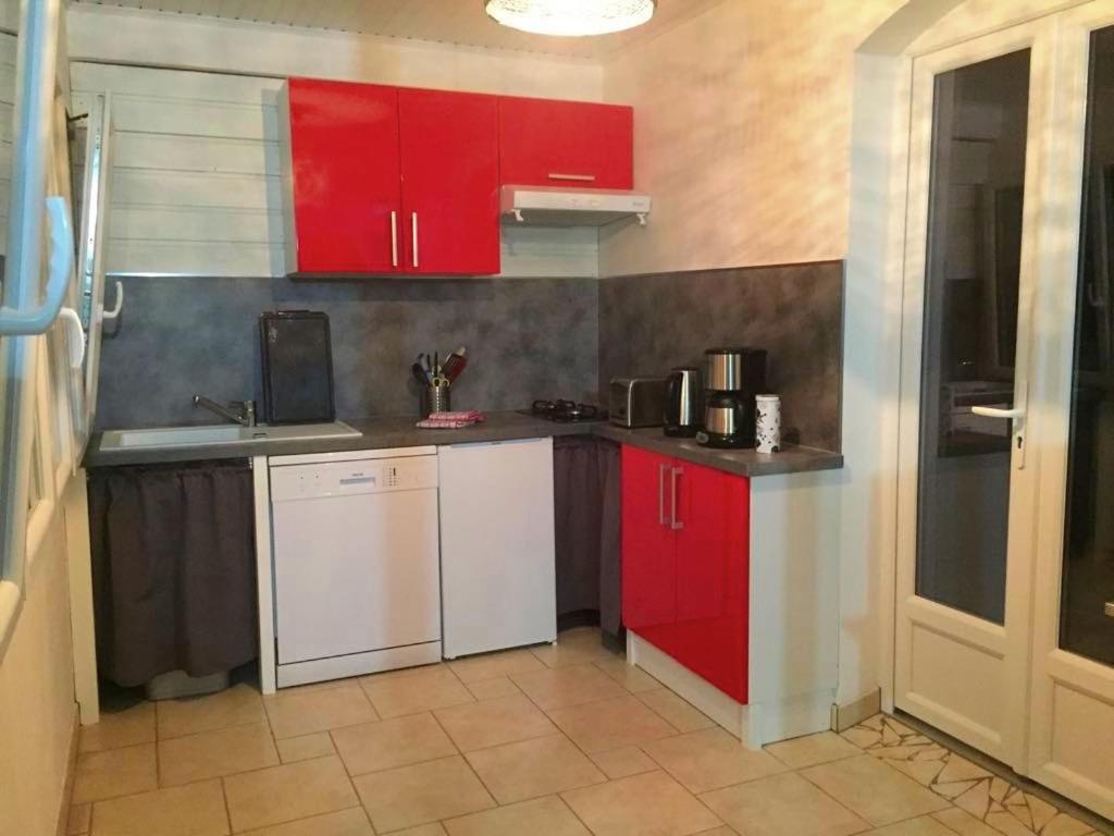 Kuchyň nebo kuchyňský kout v ubytování Habitation Diamant - Apparts & Spas