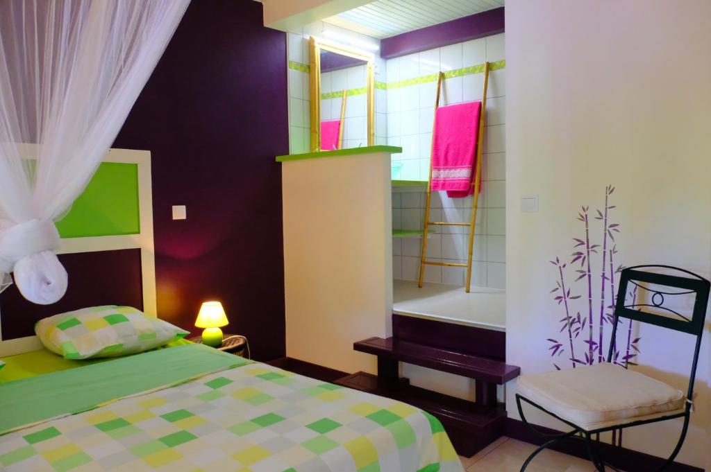 Postel nebo postele na pokoji v ubytování Habitation Diamant - Apparts & Spas