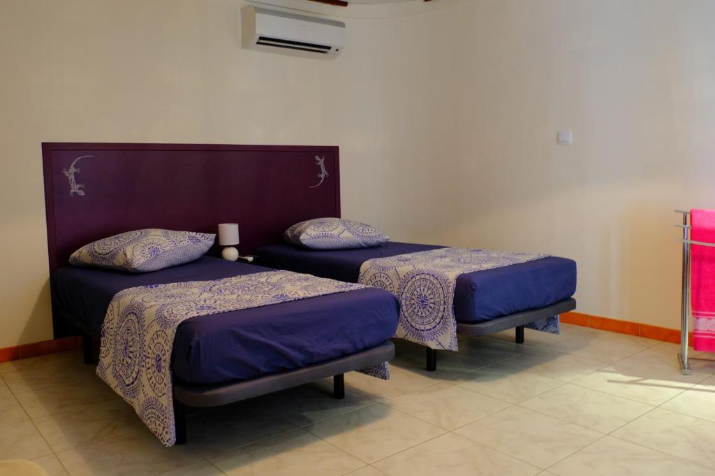 Postel nebo postele na pokoji v ubytování Habitation Diamant - Apparts & Spas