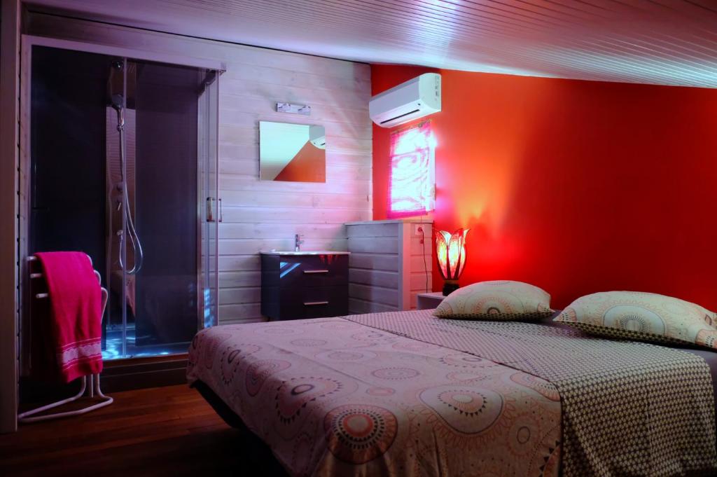Postel nebo postele na pokoji v ubytování Habitation Diamant - Apparts & Spas